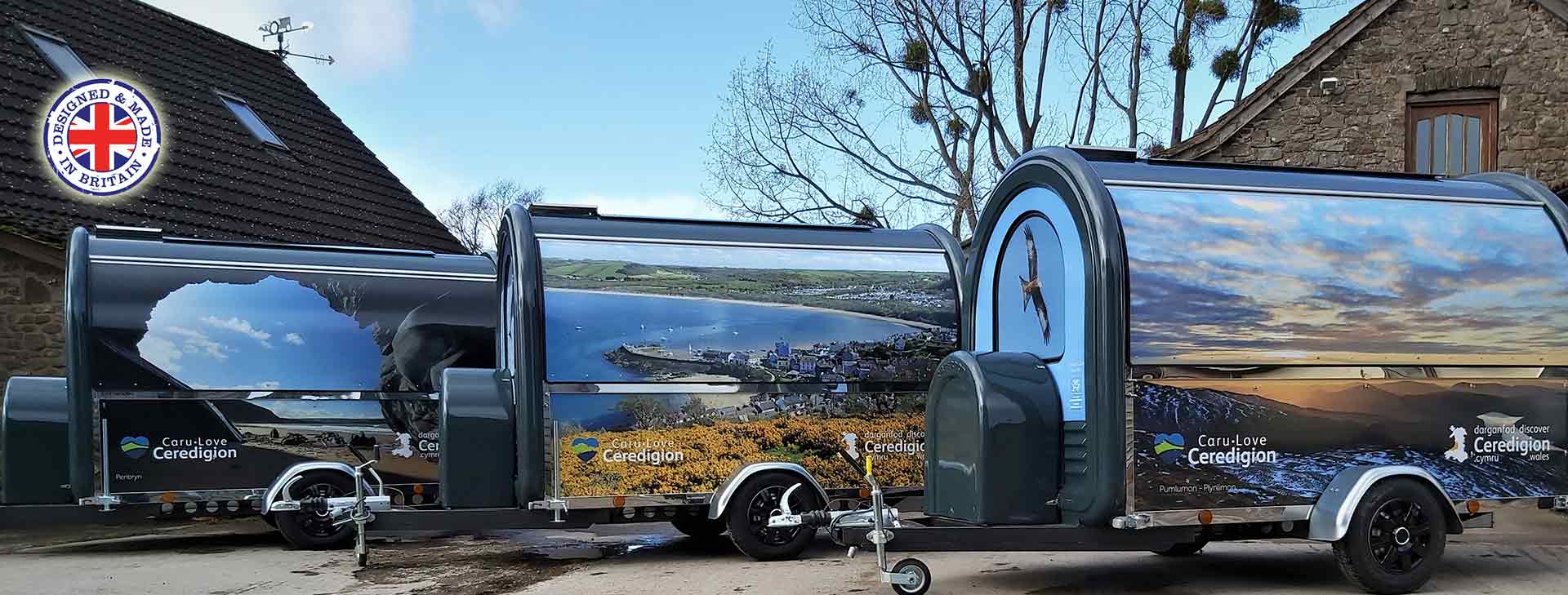 Three Caterpods trailers in Ceredigion livery