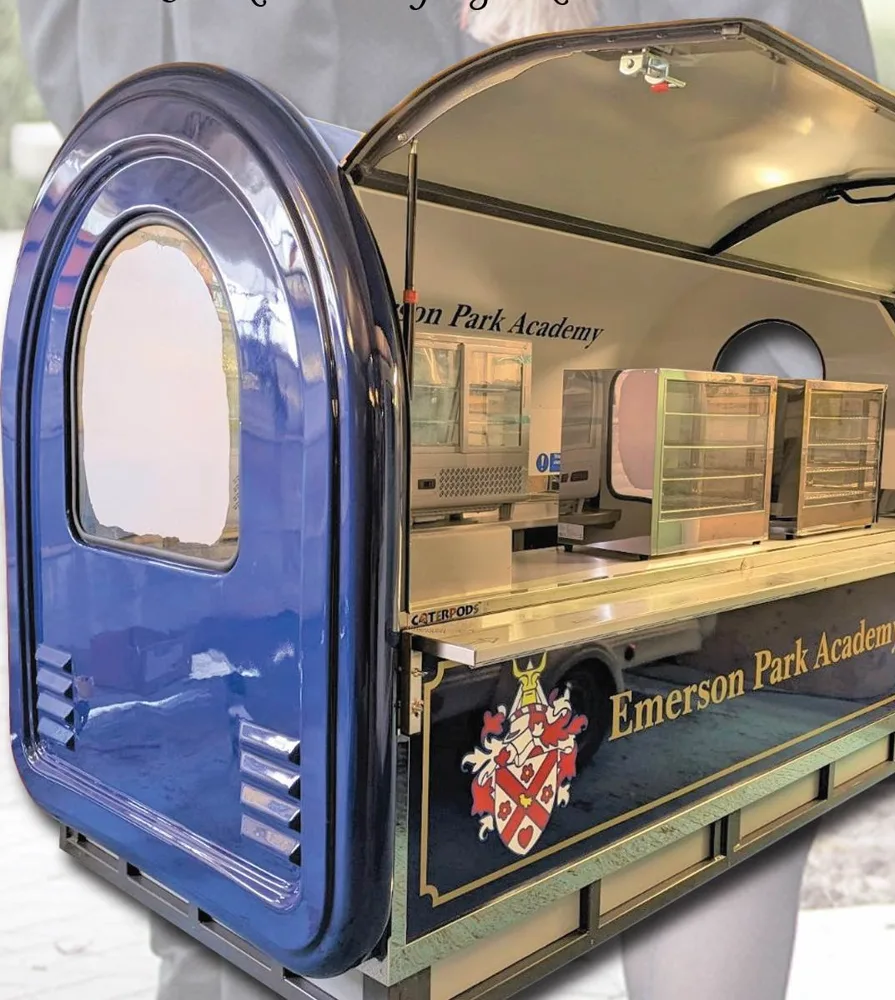 Emerson Park Academy Caterpod kiosk with the hatch open